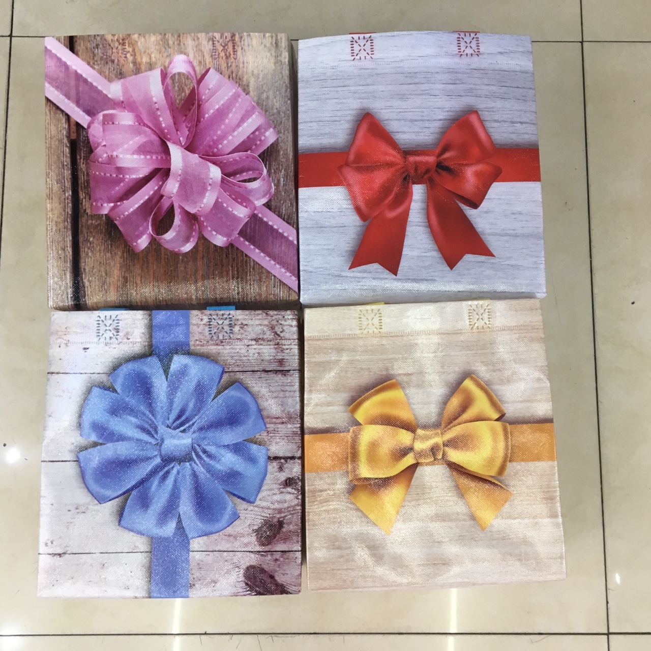 Factory direct sales of hand-held composite ribbon knot three-dimensional bags, horizontal and vertical shopping bags