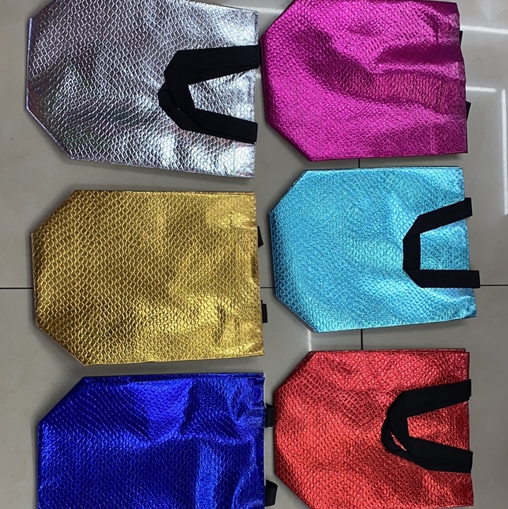 Laminated bright film three-dimensional bag
