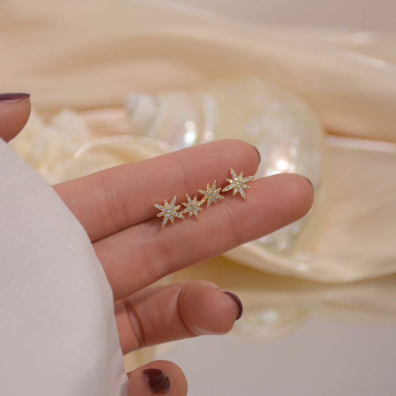 Asymmetrical octagonal stud earrings