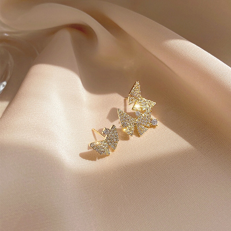 Asymmetrical butterfly stud earrings