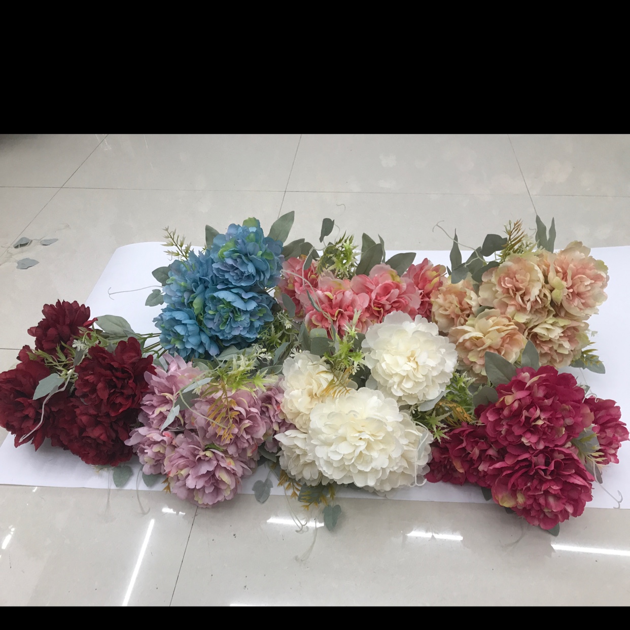 Six peonies