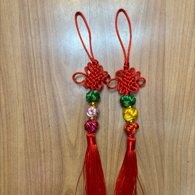 Three strings of colored balls