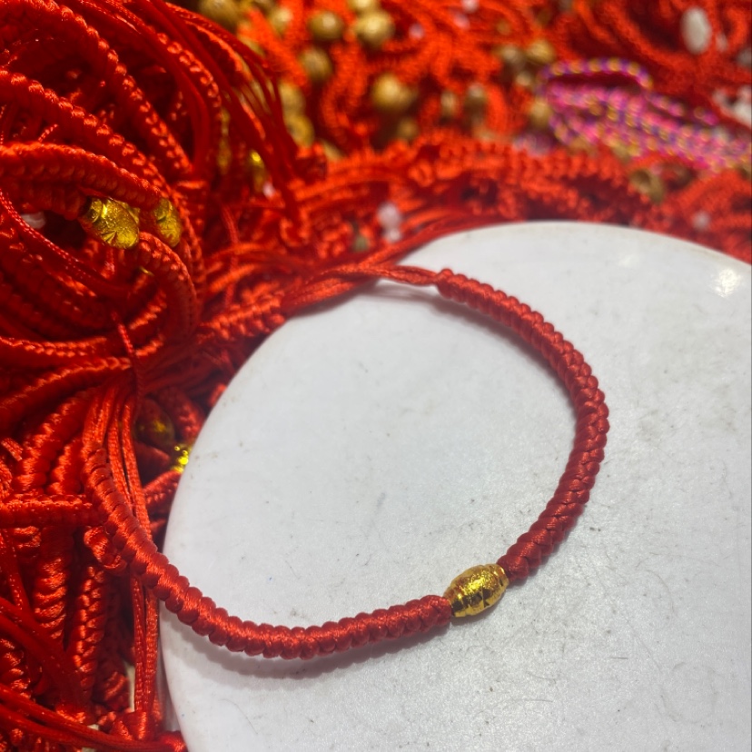 一个金珠新年款本命年红绳女手绳小珠情侣手链礼物