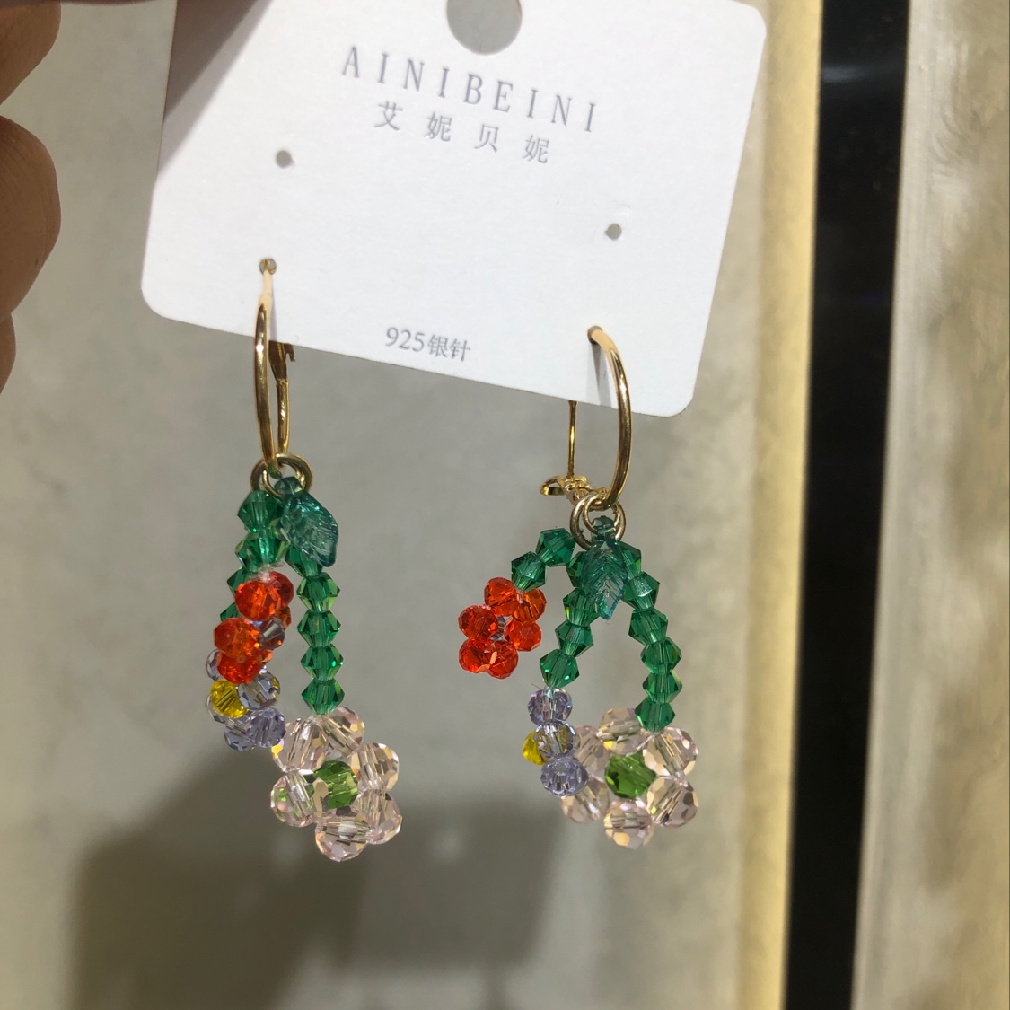 Handcrafted colored crystal ear loops