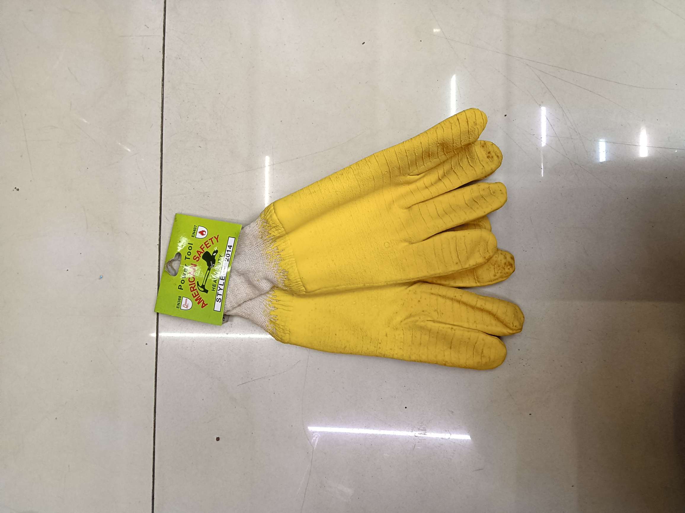 亮黄色乳胶手套产品图