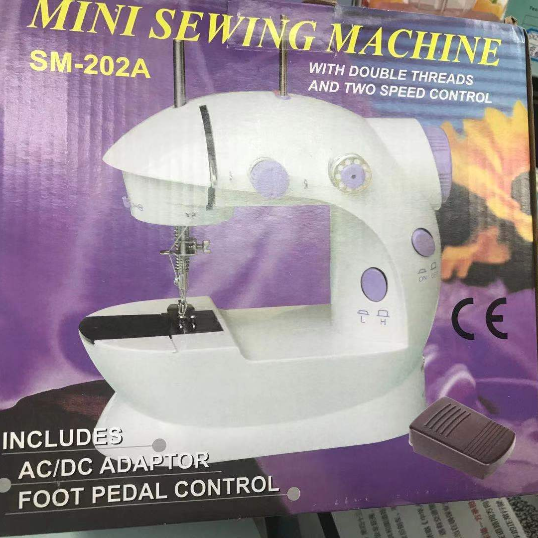 缝纫机家用电动小型迷你全自动台式吃厚手持微型脚踏衣车3