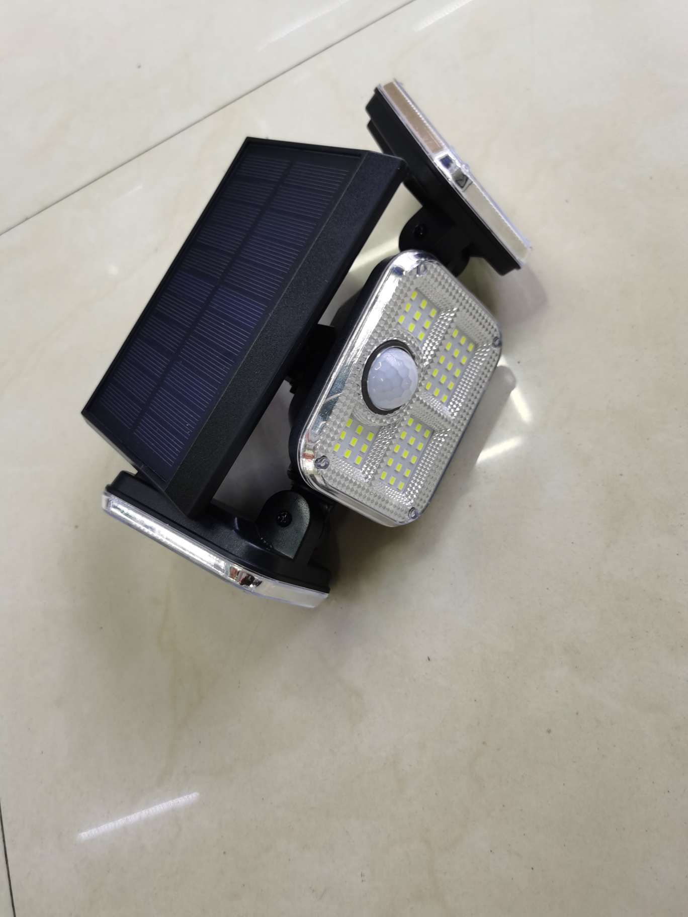 Solar sensor hanging lamp, solar 74LED three-head wall lamp, human body sensor double-head rotatable, household courtyard outdoor waterproof street lamp Item Picture