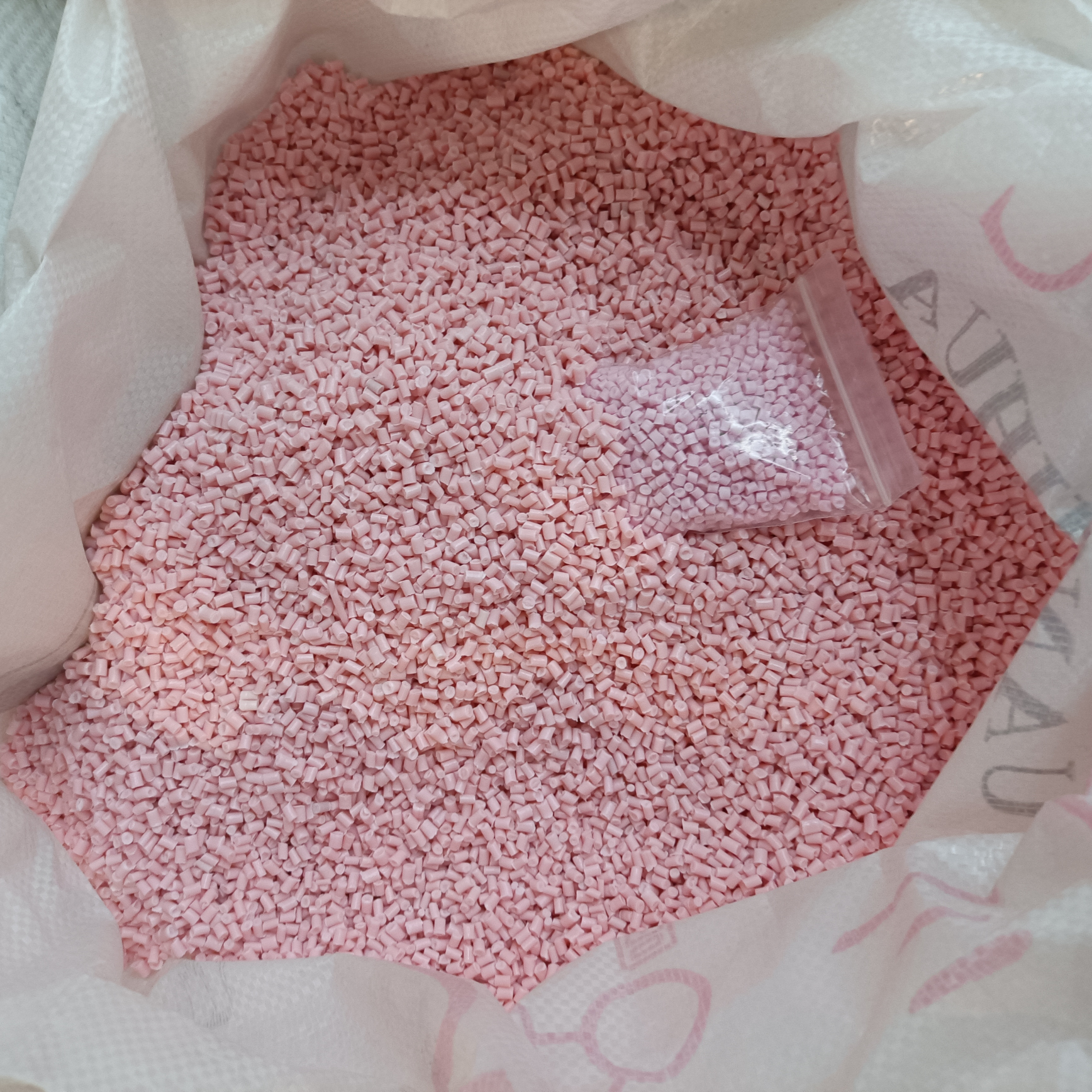 粉色PP回料塑料粒子价格面议1吨起批图
