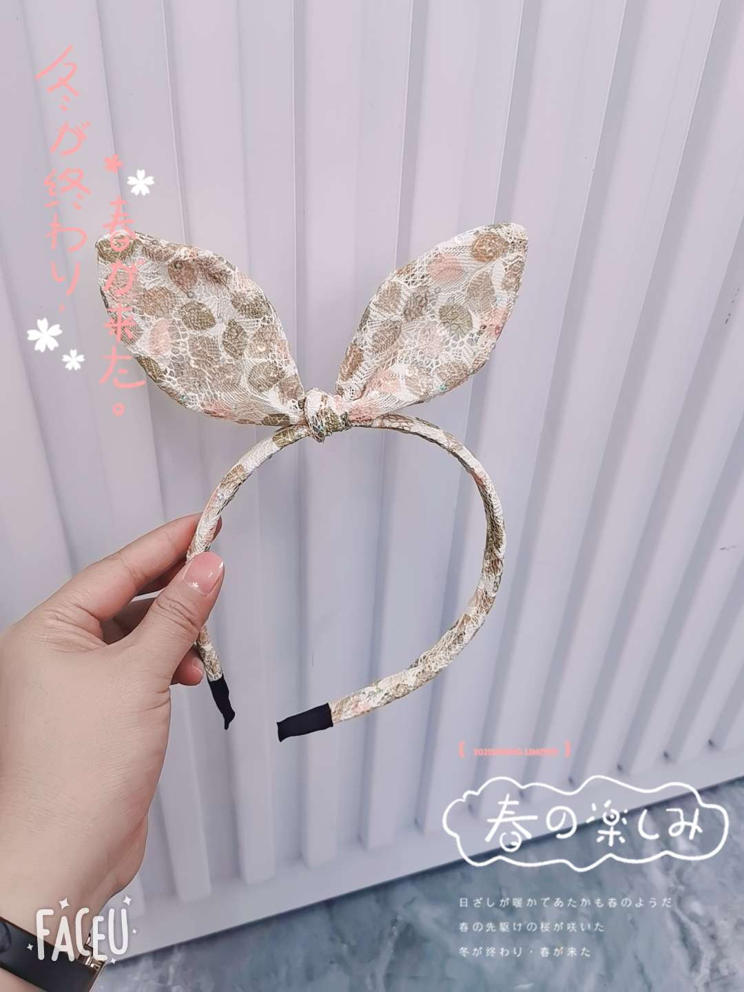 Close-up captures the fine lace pattern and gorgeous bow shape on the colorful rabbit ear headband