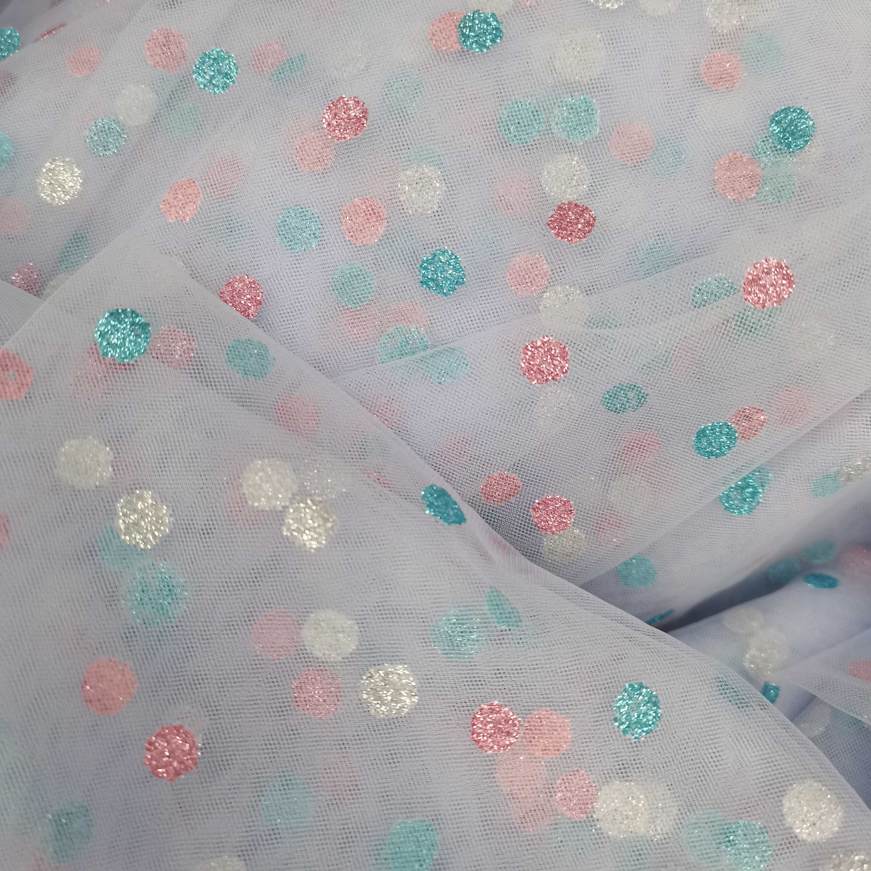 The mesh fabric is printed in gold 24 and purple