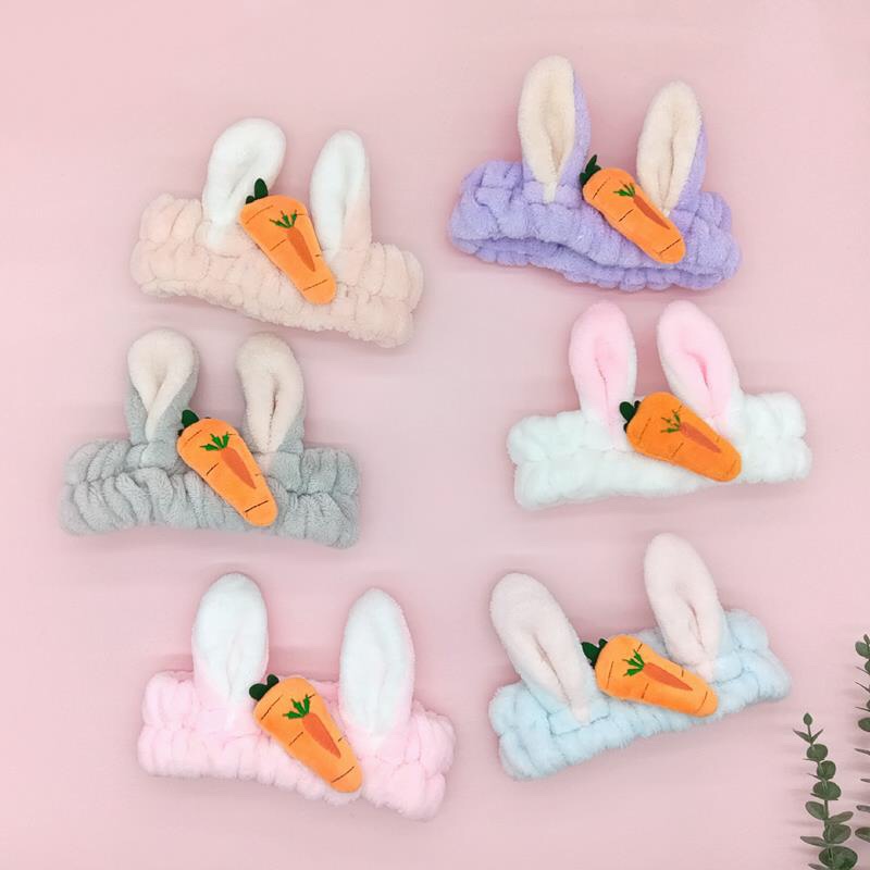 Carrot, rabbit ears, face wash and hair tie