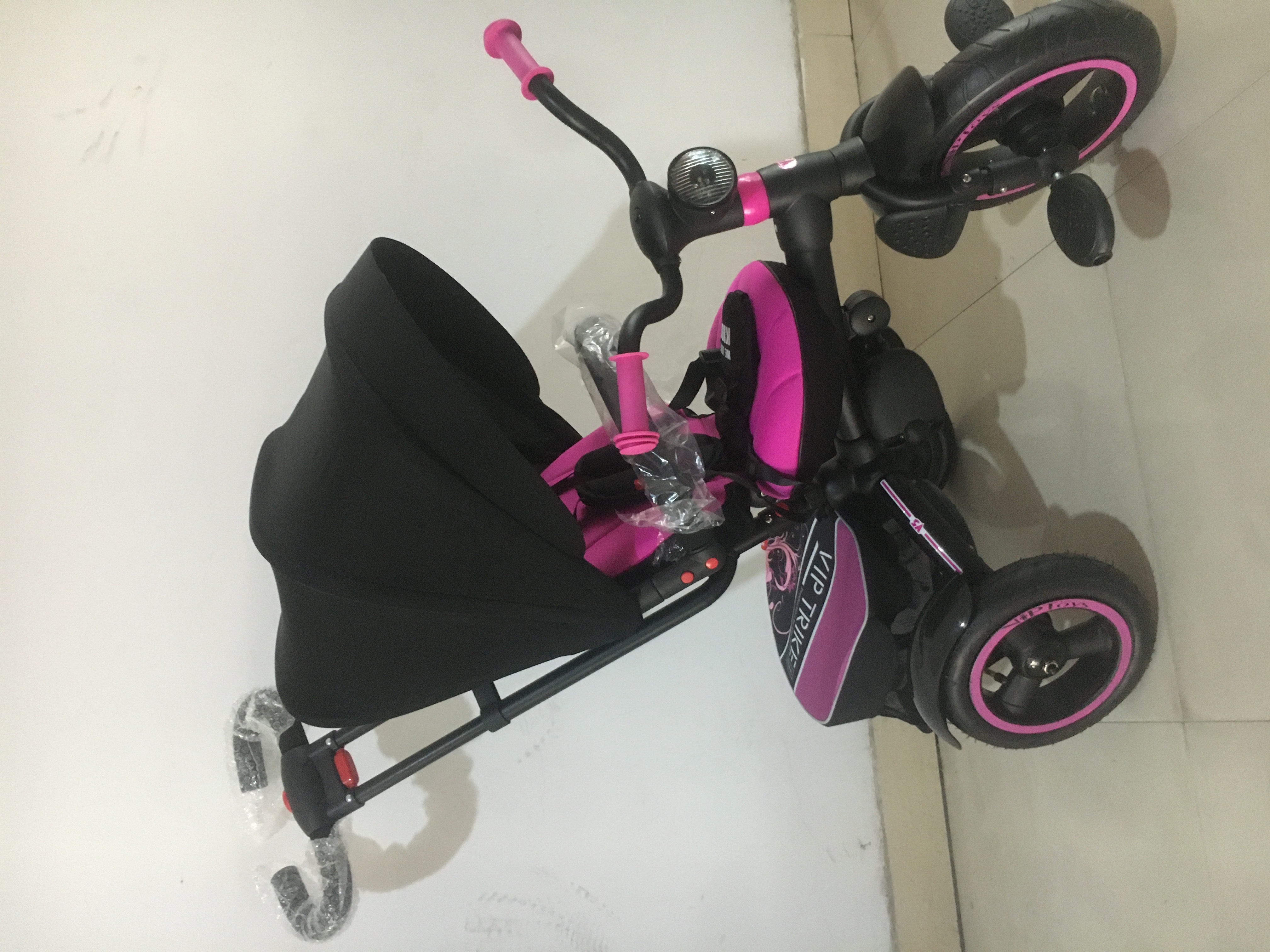 A high-end four-in-one children's tricycle with a push handle detail image 4