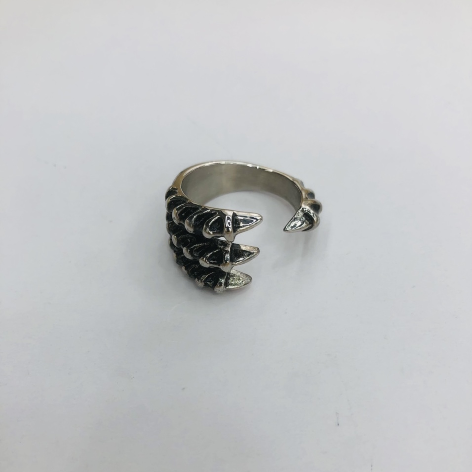 A stainless steel ring with a popular element claw design shape