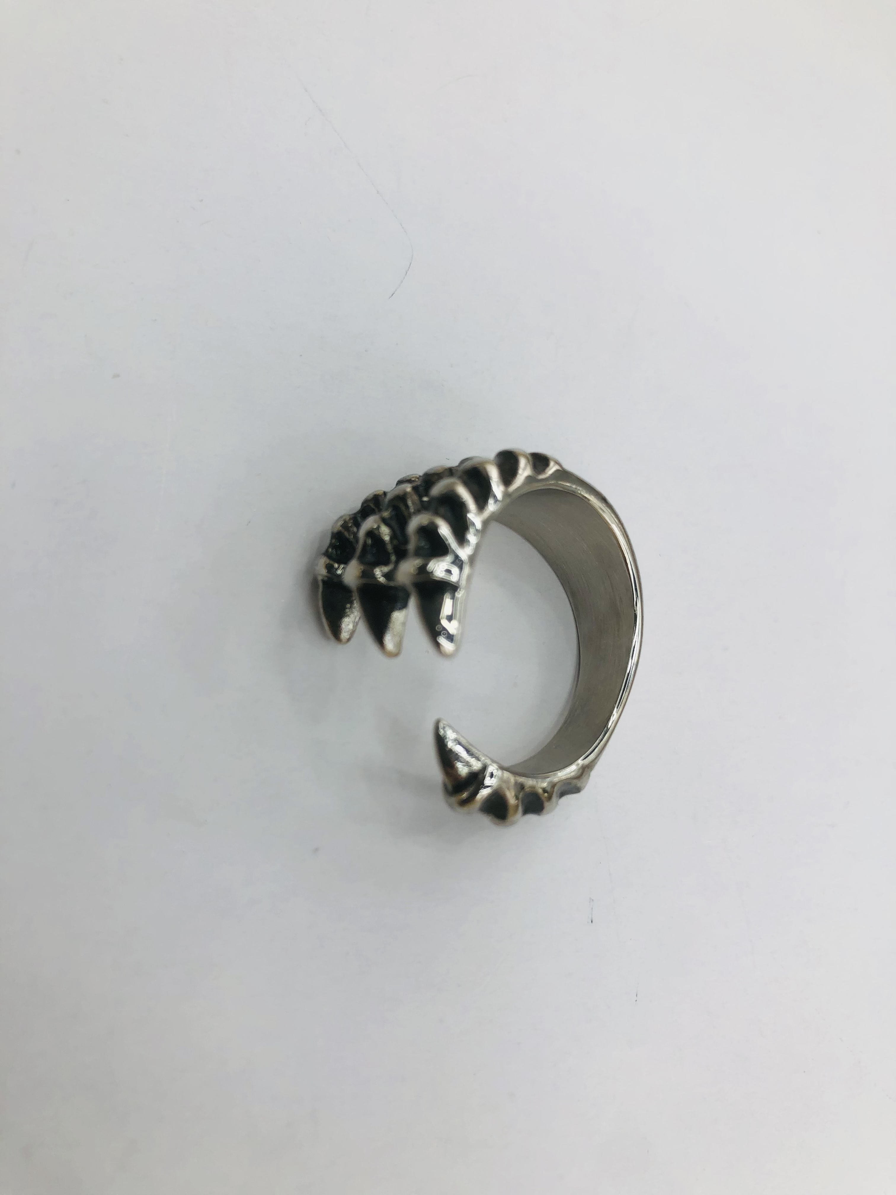 A stainless steel ring with a popular element claw design shape detail image 6