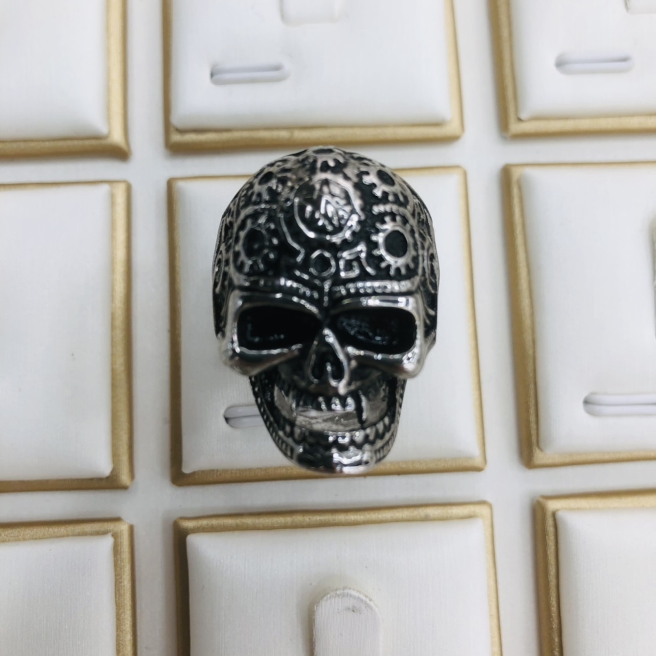 A stainless steel ring for men with a skull