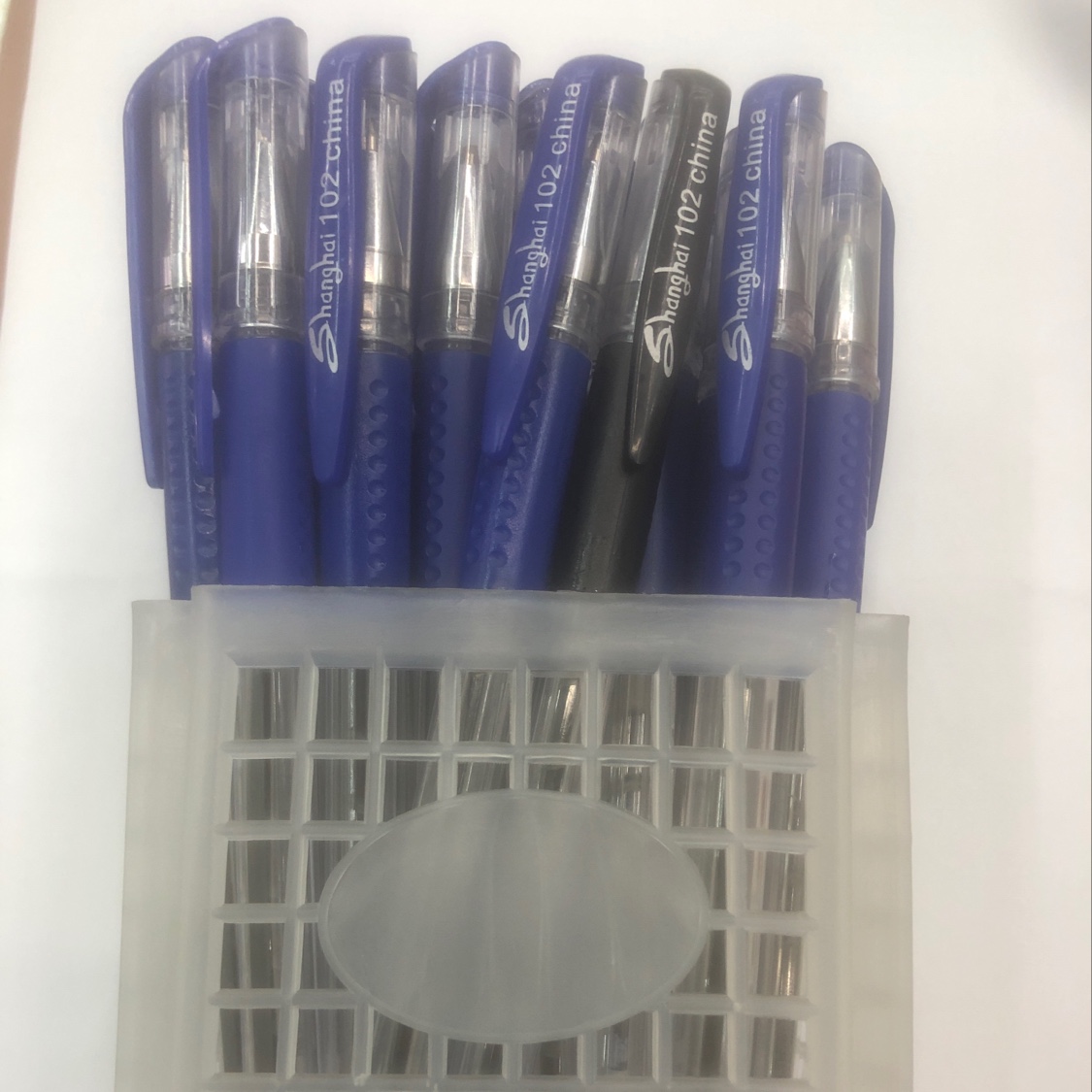 A basket of 102-48 ballpoint pens