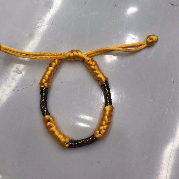 Yellow and black spacer bracelet