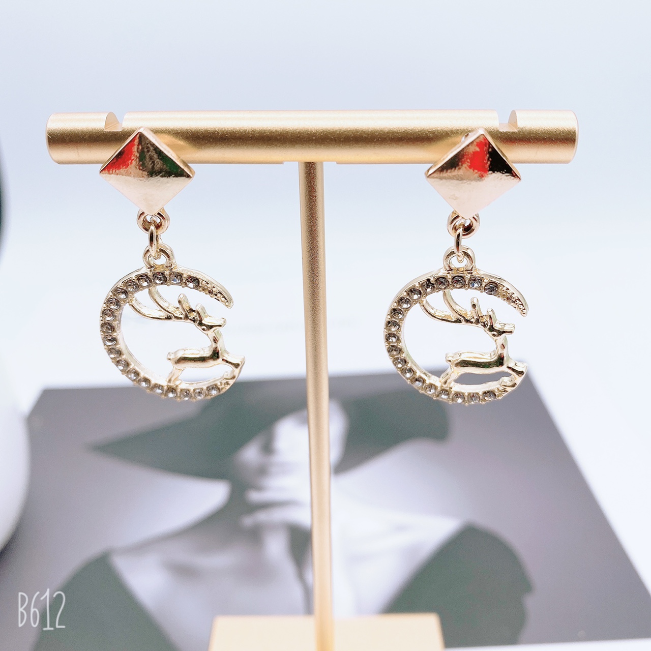 Sika deer half-moon earrings