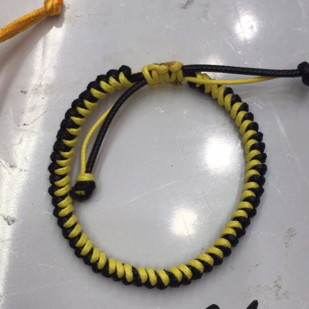 Yellow and black knot bracelet