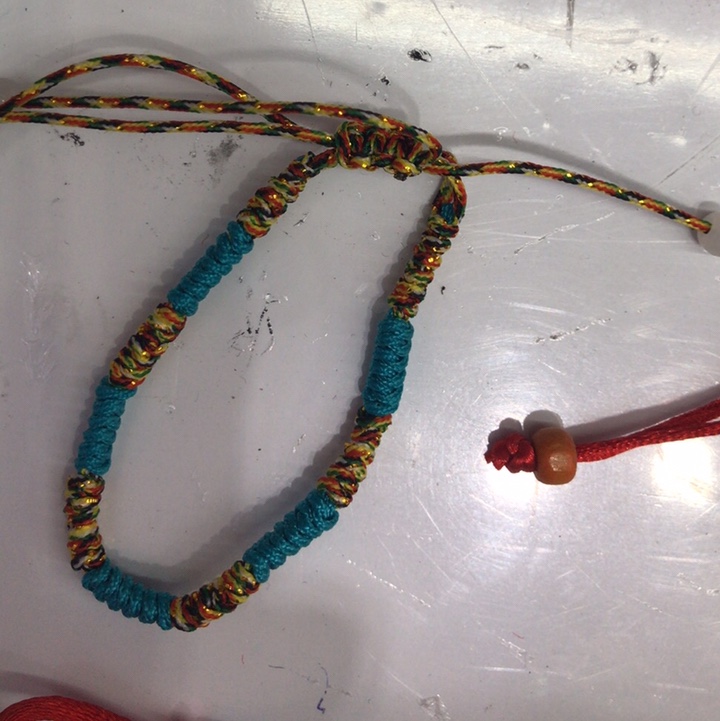 Lake blue gold thread bracelet