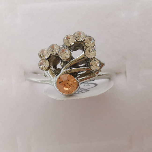 Rhinestone alloy ring seven plated white k