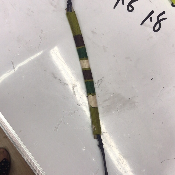 Black, white and green winding bracelet