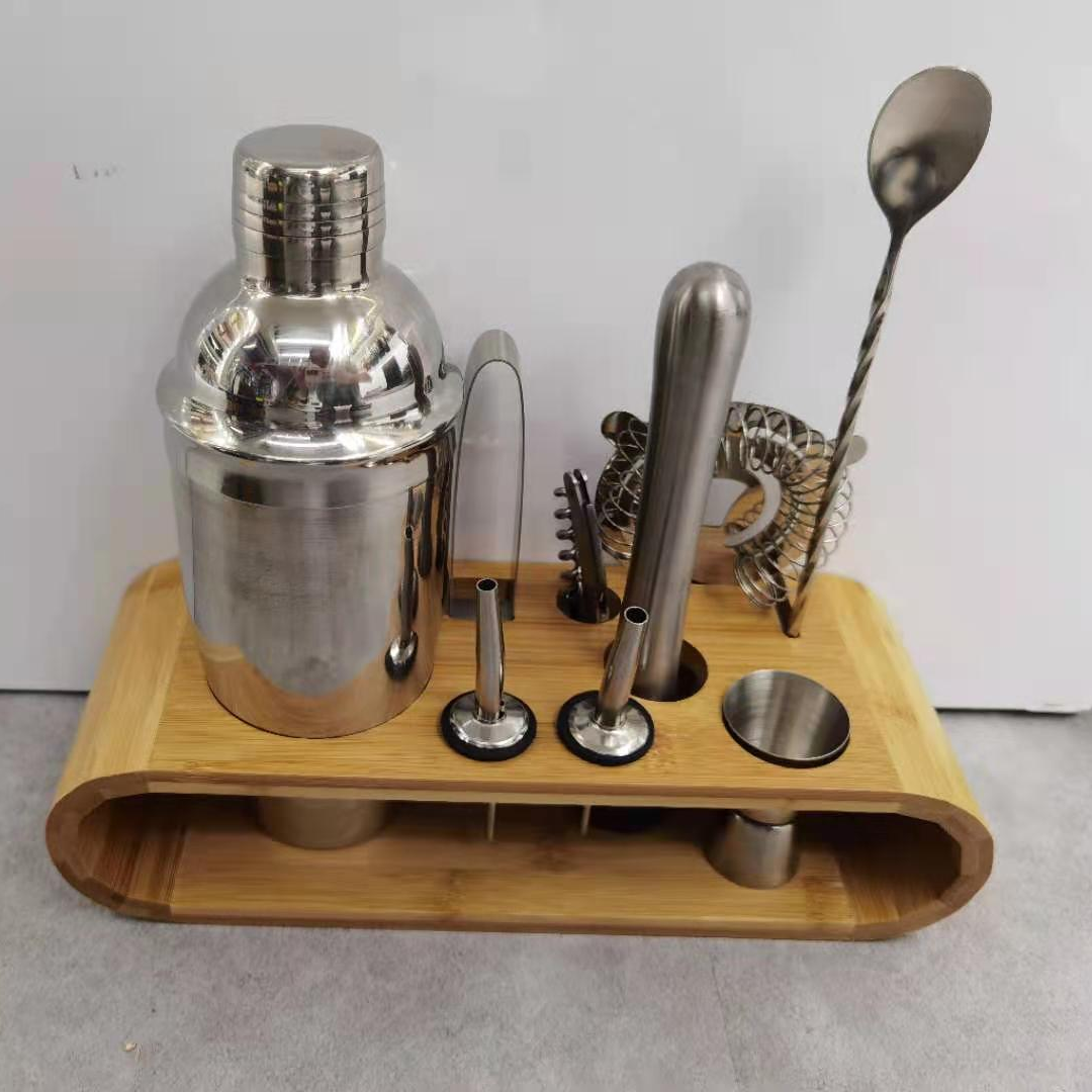 A 10-piece oval bamboo and wood cocktail set