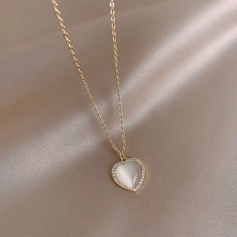 Titanium steel cat-eye heart necklace