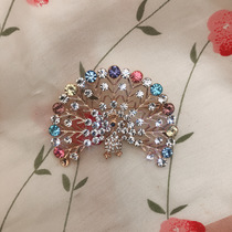 Peacock diamond brooch