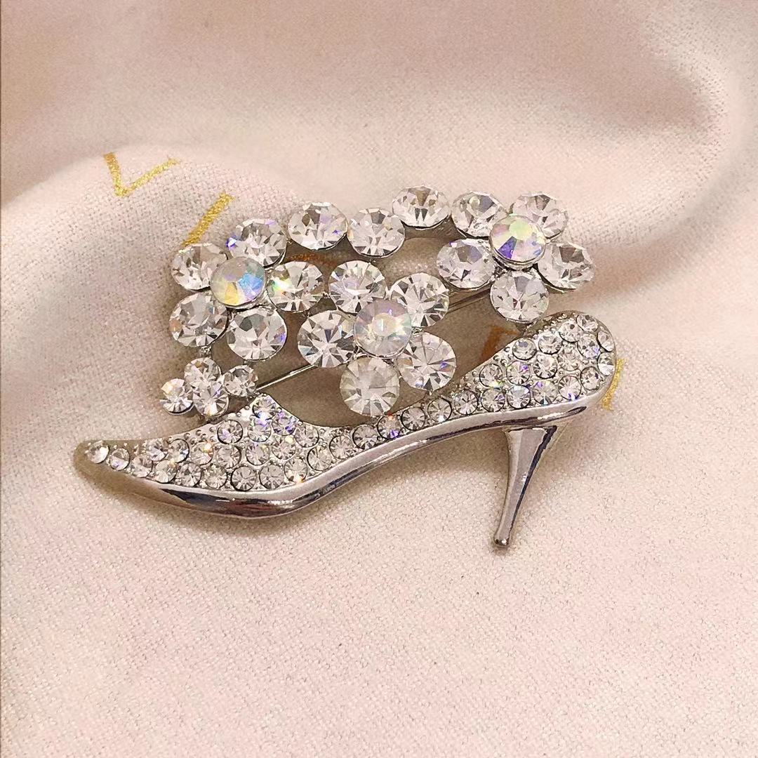 High heel brooch
