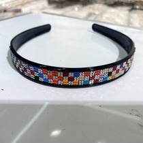 Three rows of multicolored diamonds