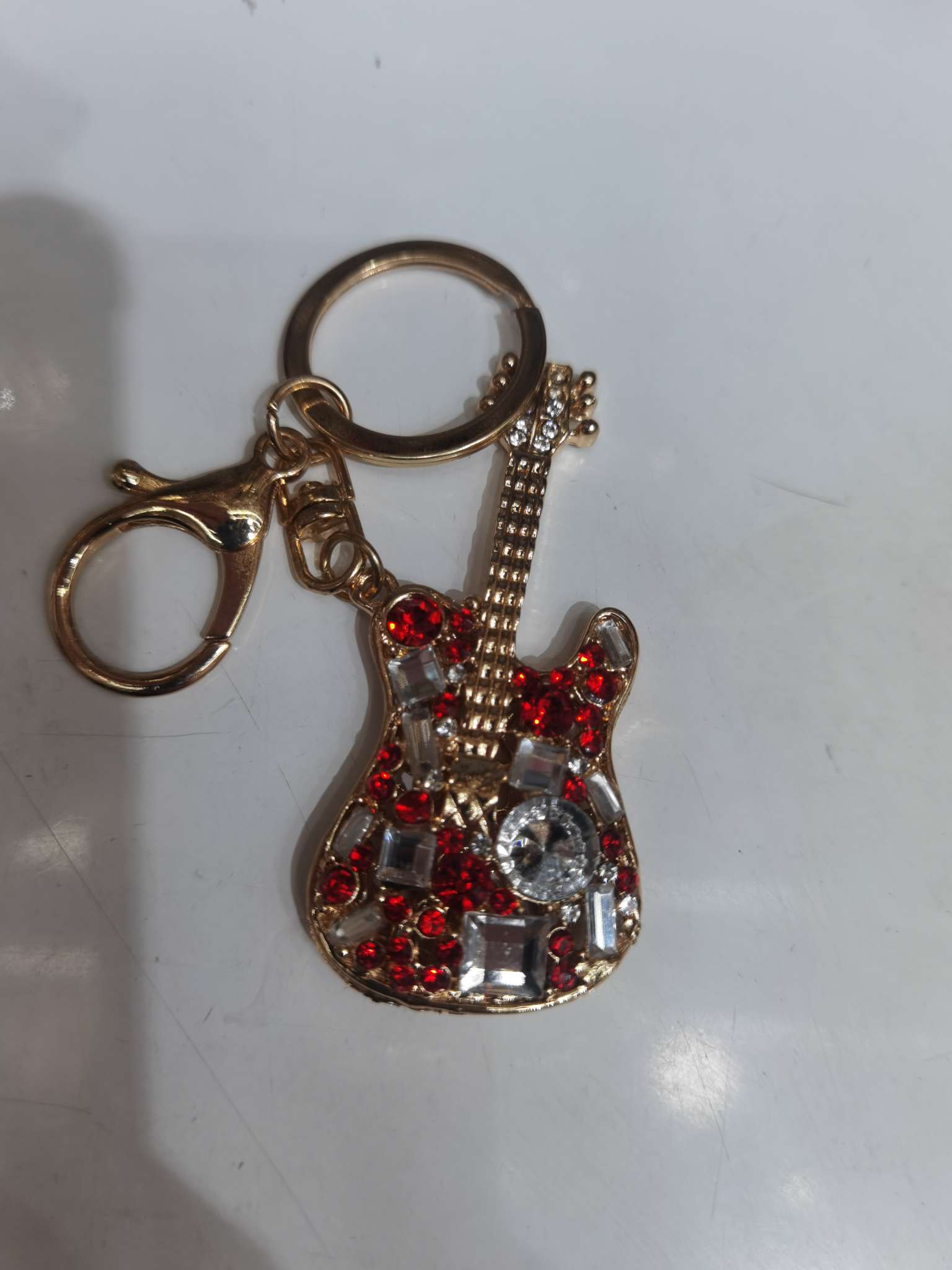 Diamond guitar 🎸 keychain details Picture