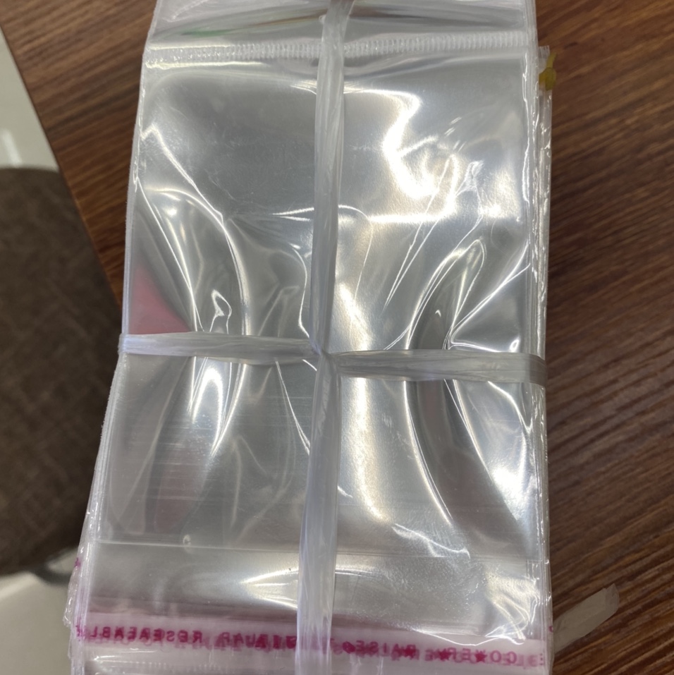 3*22 transparent packaging bags, self-adhesive OPP bags, self-adhesive opp bags, self-sealing bags, clothing plastic bags, printed LOGO