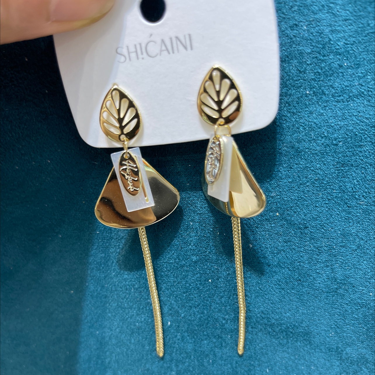 Natural seashell gold tassel earrings