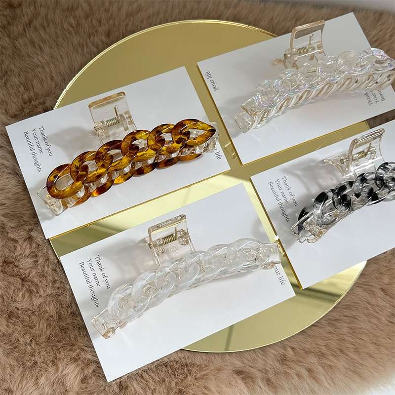Transparent resin back of the head, straight clip, large grappling clip, hair clip, updo, shark hairpin, hair clip, hair grab, headwear Application Scenario