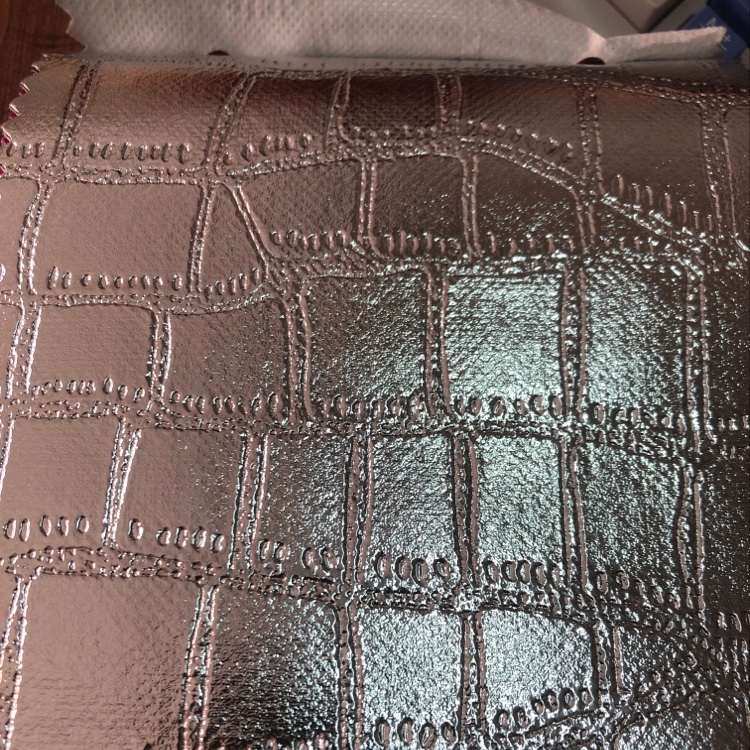 Non-woven fabric coated crocodile pattern silver leather factory direct sales bestseller