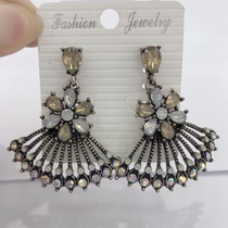 Plum hollow fan-shaped light luxury minority ethnic style fashion personality exaggerated earrings