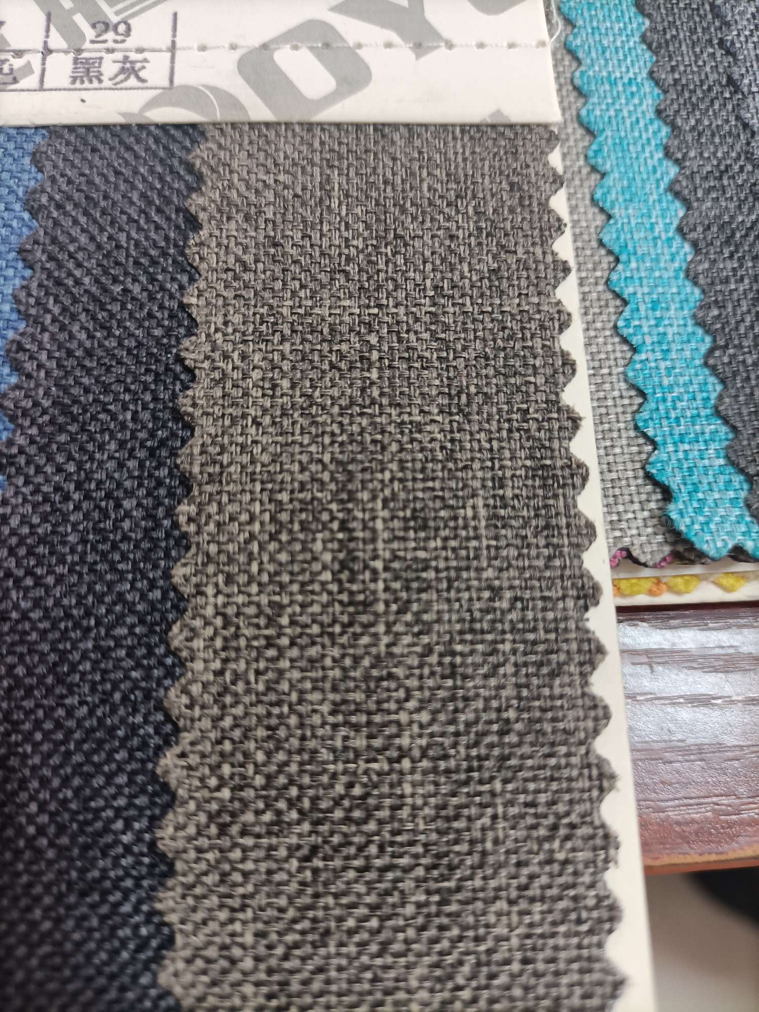 TY--012 600D Matte fabric PVC glossy texture 29# black gray details Picture