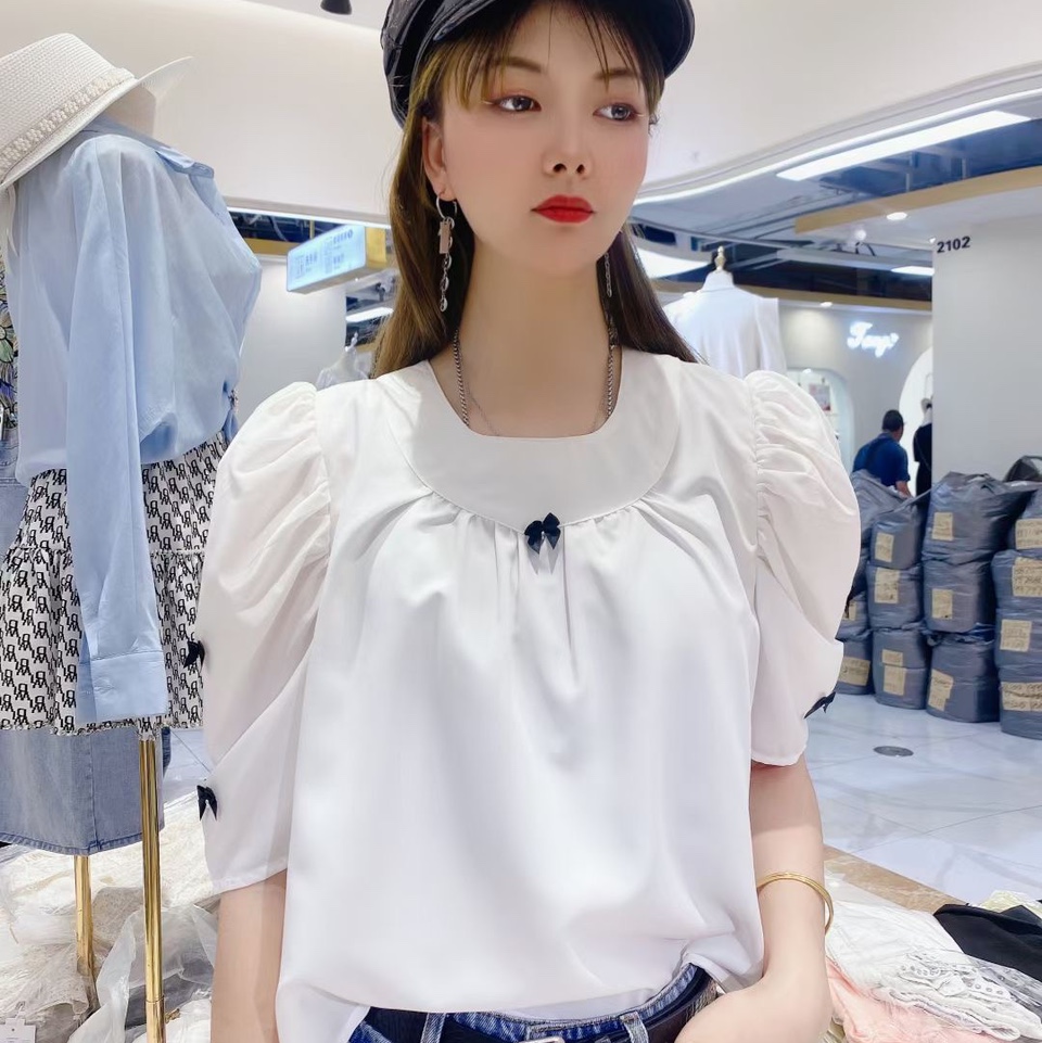 White top with puffy sleeves