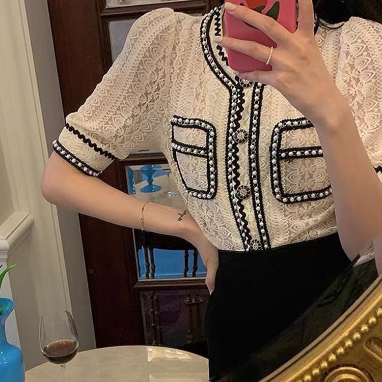 Black and white pearl blouse