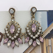 Vintage Sicilian court with ethnic earrings