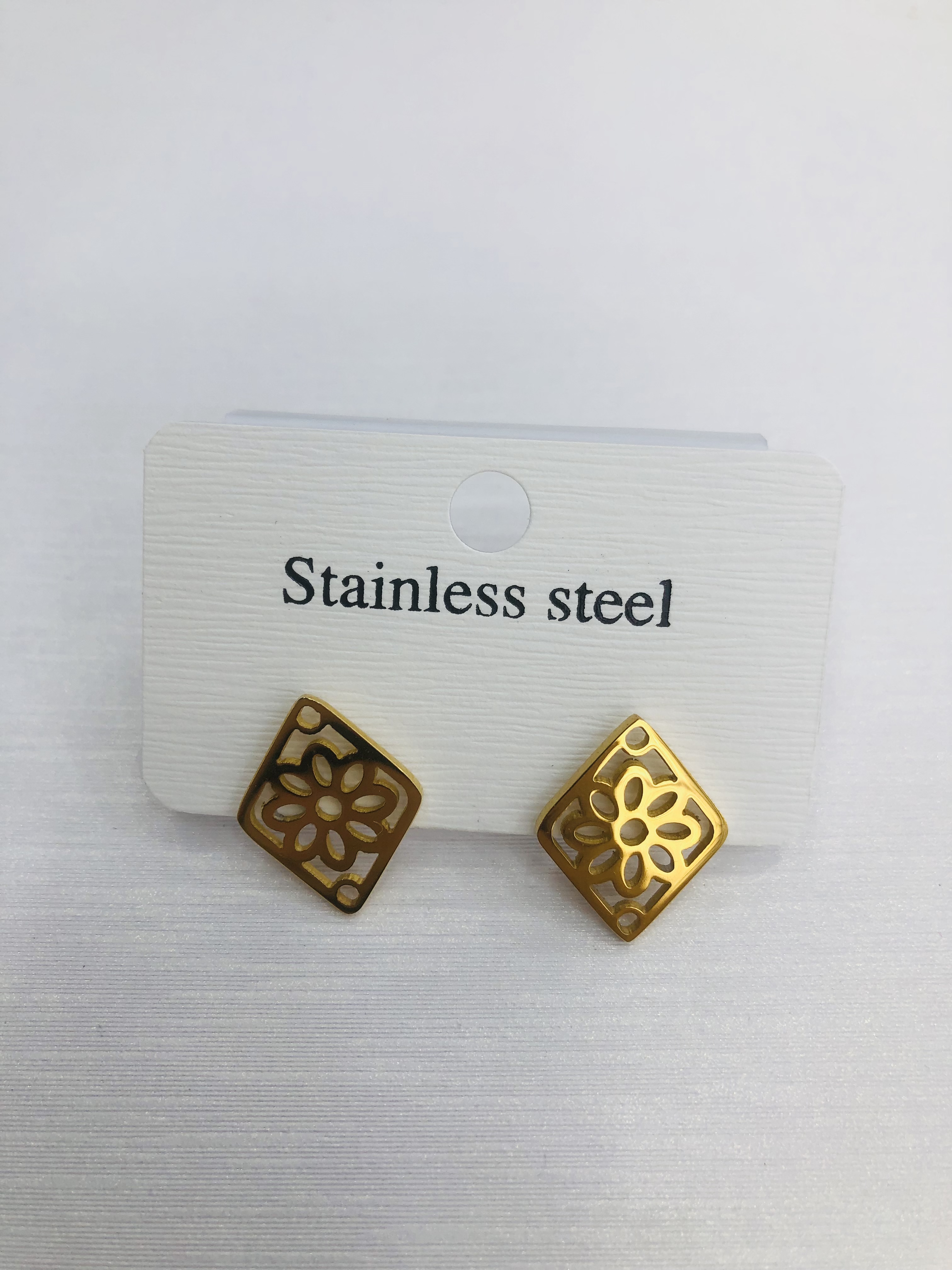 Diamond-shaped hollowed-out stainless steel earrings for girls Specification image