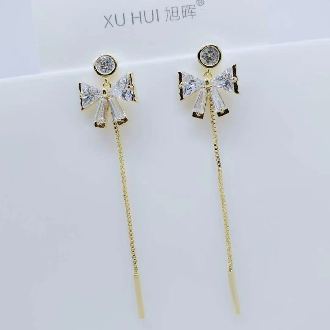 Zircon earrings with tassels