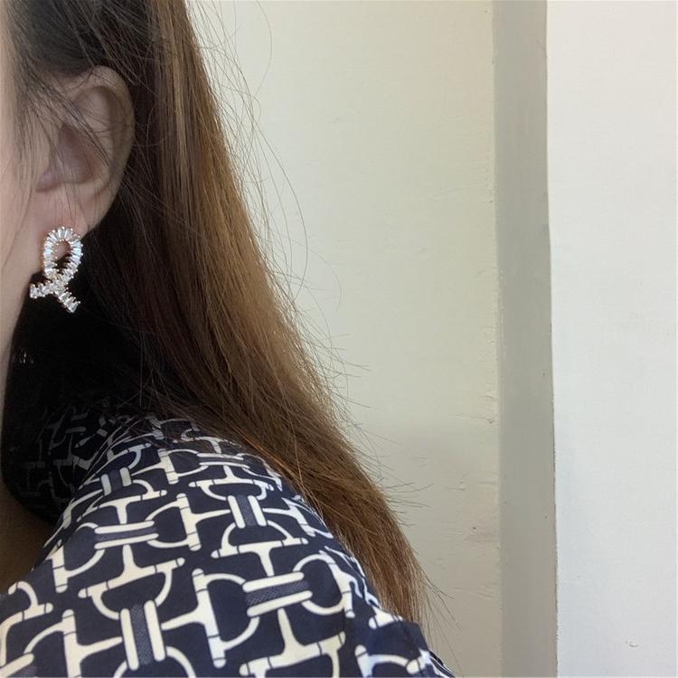 Korean exquisite and versatile cross-designed small and individual micro-inlaid zirconium diamond stud earrings, elegant and stylish stud earrings detail image 1