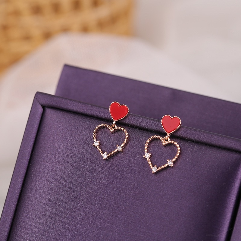 Coreano temperamento dulce corazón aretes simple y versátil calado corazón de melocotón pendientes micro insertos detail image 5