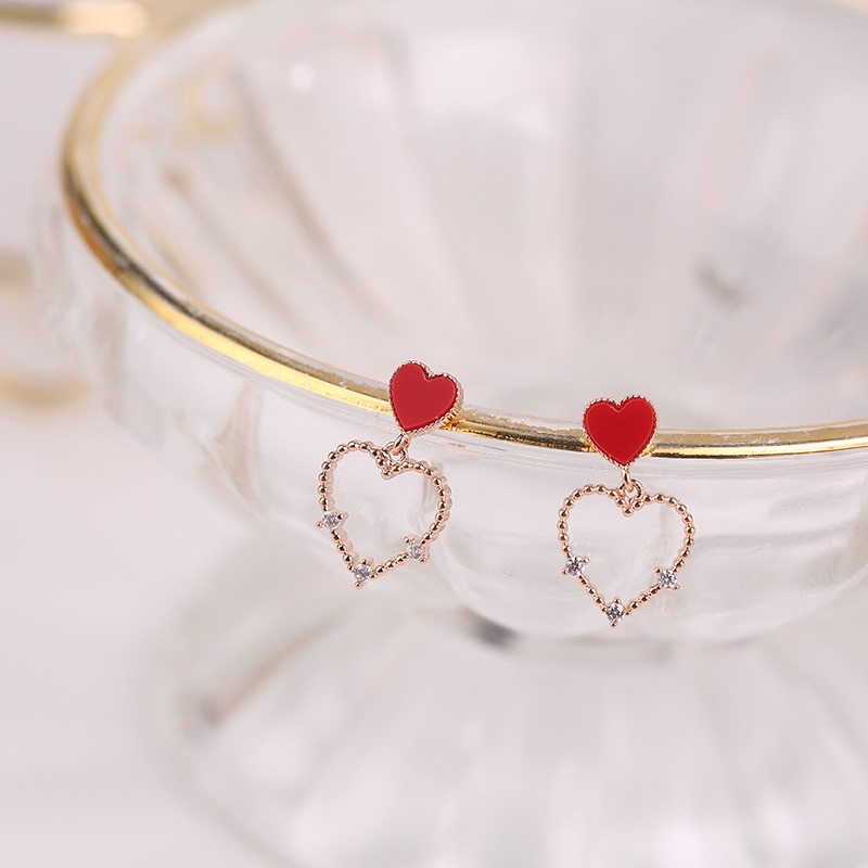 Coreano temperamento dulce corazón aretes simple y versátil calado corazón de melocotón pendientes micro insertos detail image 3