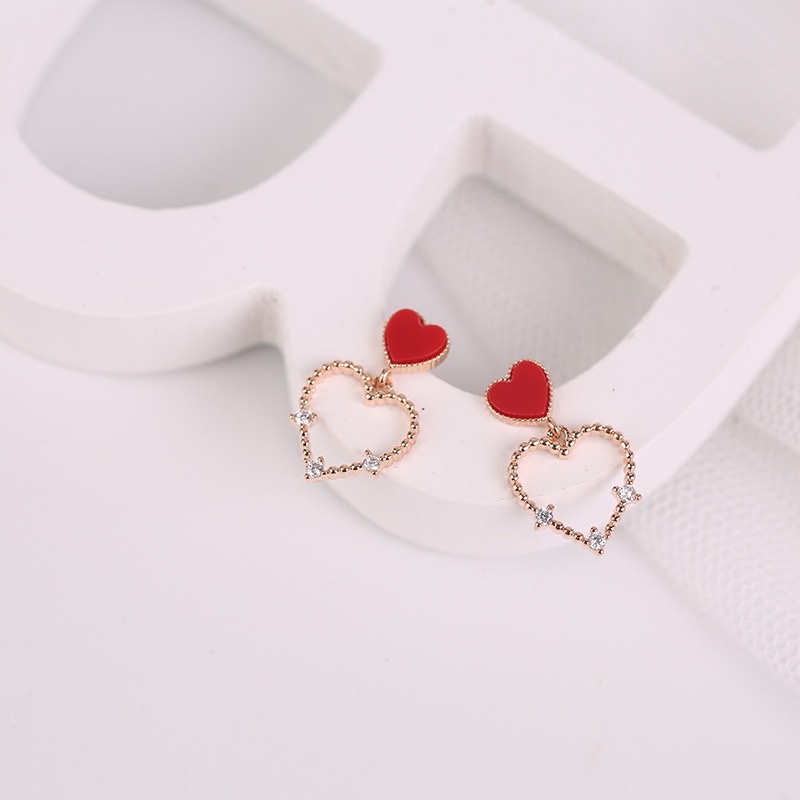 Coreano temperamento dulce corazón aretes simple y versátil calado corazón de melocotón pendientes micro insertos detail image 4