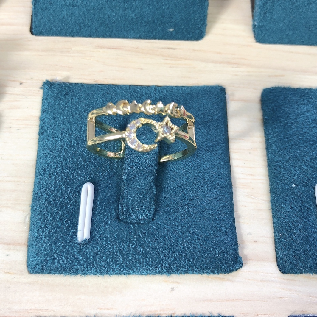 A unique and versatile double-layer hollowed-out star and moon design ring with a simple, fashionable and niche style
