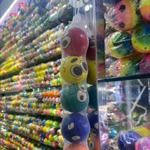 厂家直销5公分网带装彩色可爱表情笑脸男孩女孩pu球海绵球
