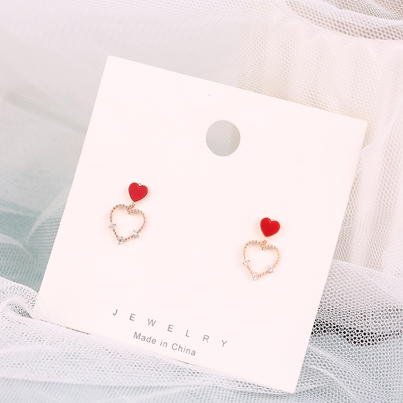 Coreano temperamento dulce corazón aretes simple y versátil calado corazón de melocotón pendientes micro insertos Item Picture